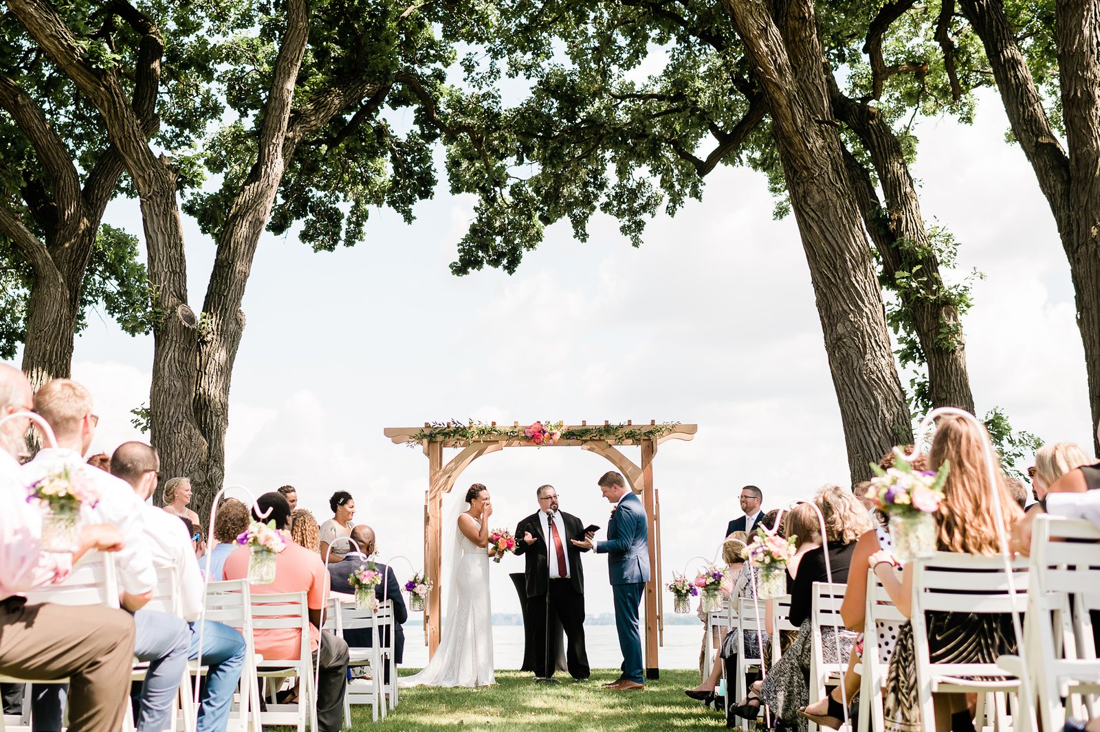 A real couple sharing a joyful moment during their wedding ceremony